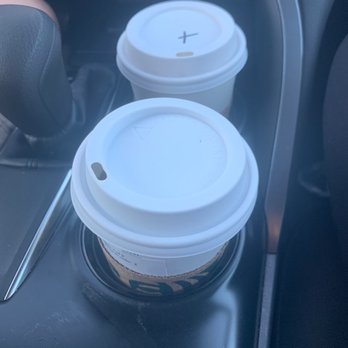 Starbucks - two cups of coffee in the center console of a car - Coffee & Tea Near Me - Woodburn, Oregon Starbucks - two cups of coffee in the center console of a car - Coffee & Tea Near Me - Woodburn, Oregon