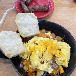 Sausage and gravy skillet with a side of sausage links. Sausage and gravy skillet with a side of sausage links.