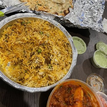 Shanti Indian Cuisine - Lamb biryani and garlic naan and lamb vindaloo - Indian Near Me - Boston, Massachusetts Shanti Indian Cuisine - Lamb biryani and garlic naan and lamb vindaloo - Indian Near Me - Boston, Massachusetts