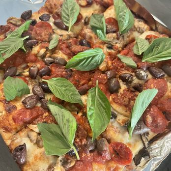 Sergio's - Grandma Style Pizza 12x12 with cup n char pepperoni, mushrooms and Kalamata olives. Fresh basil courtesy of my herb garden - Pizza Near Me - Midlothian, Virginia Sergio's - Grandma Style Pizza 12x12 with cup n char pepperoni, mushrooms and Kalamata olives. Fresh basil courtesy of my herb garden - Pizza Near Me - Midlothian, Virginia
