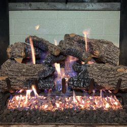 Chimney Service Experts - Charred oak logs
