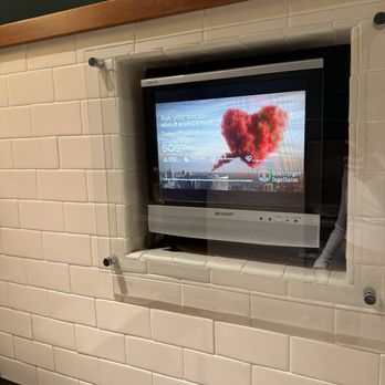 TOWN - TV in bathroom - Steakhouses Near Me - San Carlos, California TOWN - TV in bathroom - Steakhouses Near Me - San Carlos, California