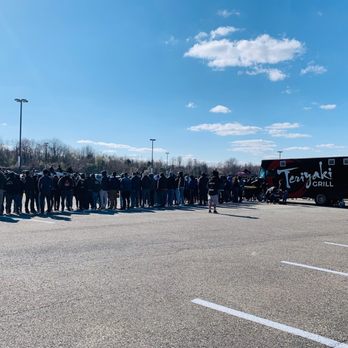 Teriyaki Grill - a large group of people standing in a parking lot - Food Trucks Near Me Teriyaki Grill - a large group of people standing in a parking lot - Food Trucks Near Me
