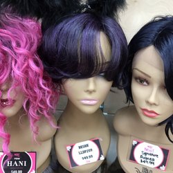 KC Beauty & Cosmetics - Wig World - has soooo many all around the store - they also have cosmetics and beauty accessories for hair