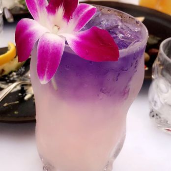 Costa Grill Beach Bar - a purple and white cocktail - American Near Me - Sunny Isles Beach, Florida Costa Grill Beach Bar - a purple and white cocktail - American Near Me - Sunny Isles Beach, Florida