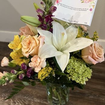 Town South Floral - Designer's Choice containing poisonous Peruvian Lilies and White Lillies. - Florists Near Me - Lubbock, Texas Town South Floral - Designer's Choice containing poisonous Peruvian Lilies and White Lillies. - Florists Near Me - Lubbock, Texas