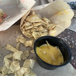 Bag of chips all crushed and literally a quarter cup of cheese dip. What!!??!!??