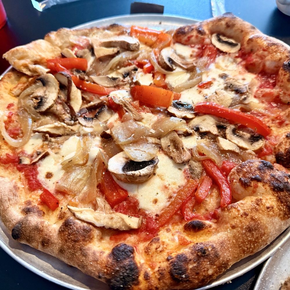 Hudson Grill - Here is an all veggie with red sauce, red peppers, mushrooms, and onions. - American Near Me - Hudson, Florida Hudson Grill - Here is an all veggie with red sauce, red peppers, mushrooms, and onions. - American Near Me - Hudson, Florida