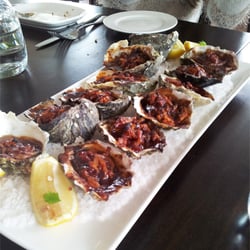 The Strand - Tasmanian Pacific Oysters freshly shucked, Kilpatrick - smoked bacon and worcestershire sauce.