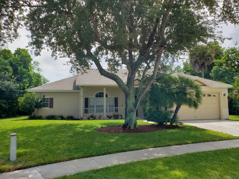 Slide of South Florida Roofing