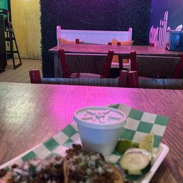 Asada and pastor street tacos with a side of beans. Asada and pastor street tacos with a side of beans.