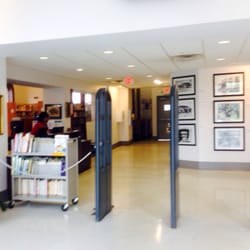 Durham County Public Library—Stanford L. Warren Branch - Directly inside of the library. Kids to the right, adults to the left.