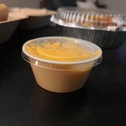 All About The Crust - Ask for a side of Wiz and this is what I got sent for $5 and it's not even real Wiz you can tell it's Government cheese it's fake.