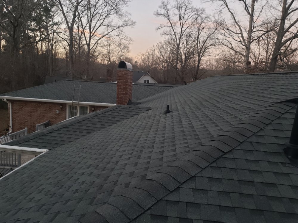 Slide of Real Deal Roofing