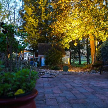 Snipes Lawn & Landscaping - a patio with a fire pit - Landscape Architects or Designers Near Me - Chesapeake, Virginia Snipes Lawn & Landscaping - a patio with a fire pit - Landscape Architects or Designers Near Me - Chesapeake, Virginia