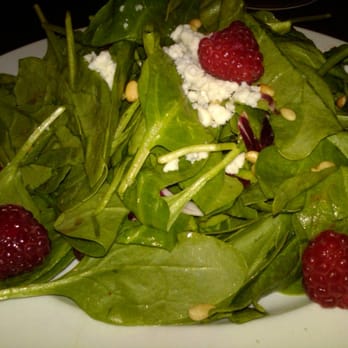 Seasons 52 - Baby Spinach Salad with raspberries, toasted pine nuts and crumbled Oregon blue chees - New American Near Me - Costa Mesa, California Seasons 52 - Baby Spinach Salad with raspberries, toasted pine nuts and crumbled Oregon blue chees - New American Near Me - Costa Mesa, California
