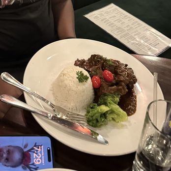 Negril Village - Oxtails jasmine rice - Caribbean Near Me - New York, New York