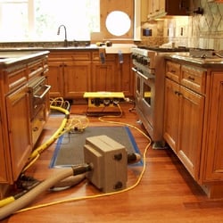 Certified Cleaning & Restoration - Saving water damaged wood floors and kitchen cabinets
