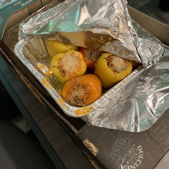 Regina’s Catering - a box of food - Caterers Near Me