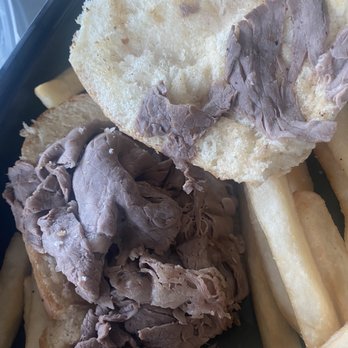 Café Central - French Dip, with very dry, grey meat and a dry bun.  Tasted very mediocre, at best. - American Near Me - Reno, Nevada
