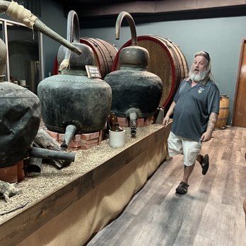 Ozark Hills Winery - Very old copper moonshine stills. - Wine Tasting Room Near Me - Branson, Missouri Ozark Hills Winery - Very old copper moonshine stills. - Wine Tasting Room Near Me - Branson, Missouri