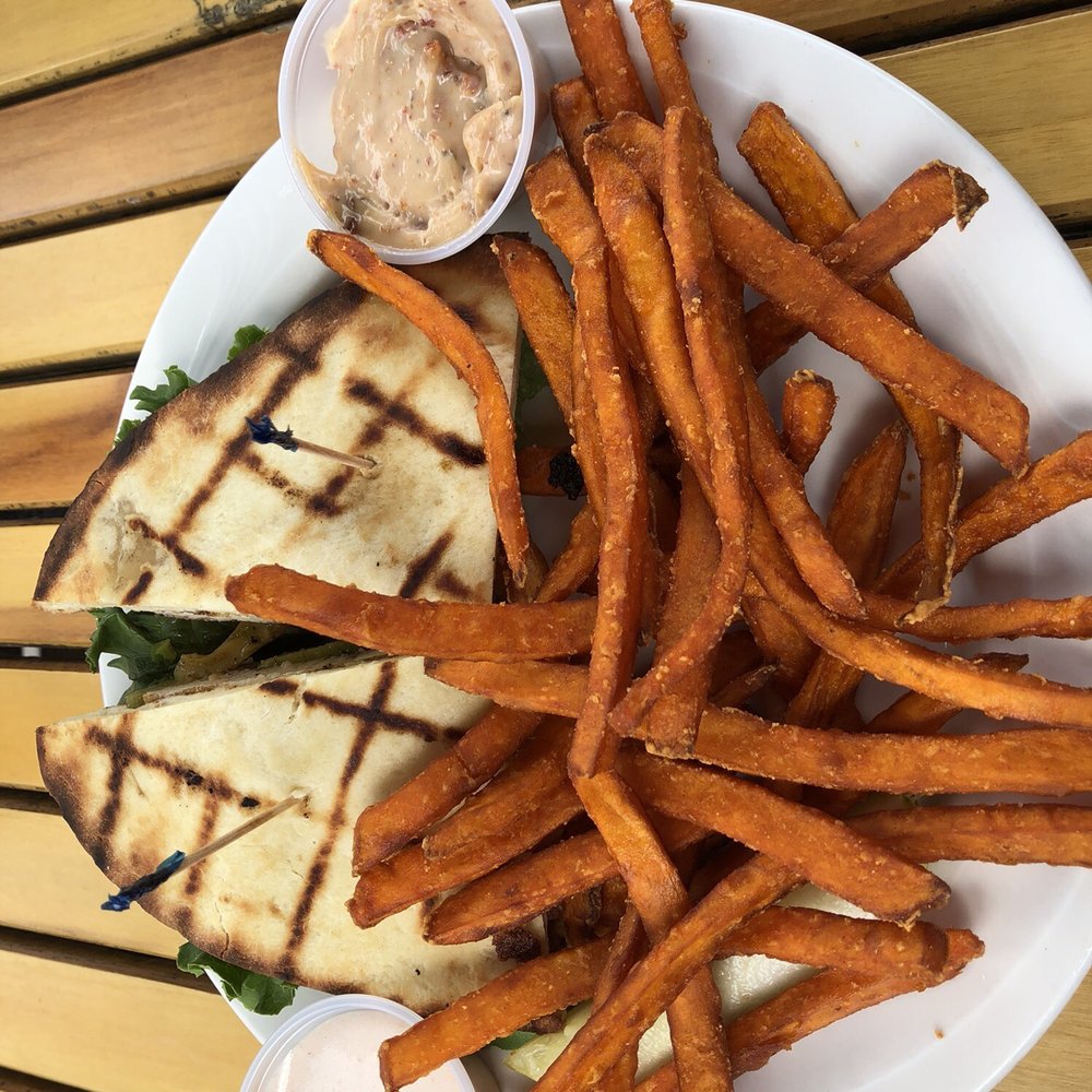 Cowboys - Grilled Chicken avocado sandwich on naan - Breakfast & Brunch Near Me - Lake Shore, Minnesota Cowboys - Grilled Chicken avocado sandwich on naan - Breakfast & Brunch Near Me - Lake Shore, Minnesota