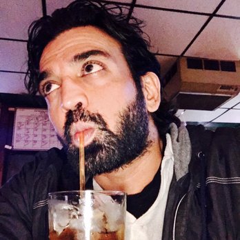 Anticipation - a man drinking a drink with a straw - Dive Bars Near Me - Milwaukee, Wisconsin Anticipation - a man drinking a drink with a straw - Dive Bars Near Me - Milwaukee, Wisconsin
