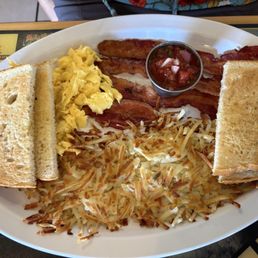 Eggs and Bacon breakfast with hashbrowns and toast Eggs and Bacon breakfast with hashbrowns and toast