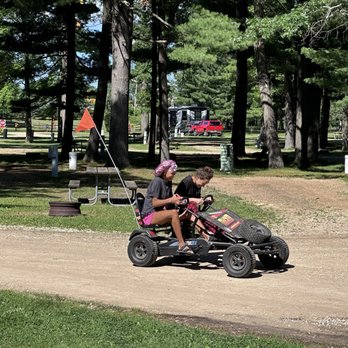 Oakdale KOA - Girls having fun with bike rentals - RV Parks Near Me - Oakdale, Wisconsin Oakdale KOA - Girls having fun with bike rentals - RV Parks Near Me - Oakdale, Wisconsin