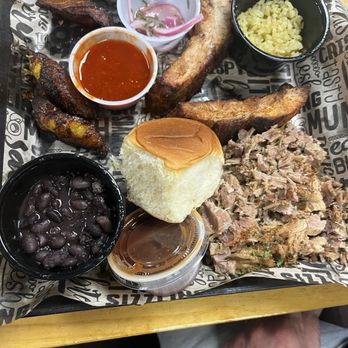 Rockin' Chicken - 3 meat platter (chicken already devoured) with fried plantains, beans and rice with this amazing house relish. - Tex-Mex Near Me - Evansville, Indiana Rockin' Chicken - 3 meat platter (chicken already devoured) with fried plantains, beans and rice with this amazing house relish. - Tex-Mex Near Me - Evansville, Indiana