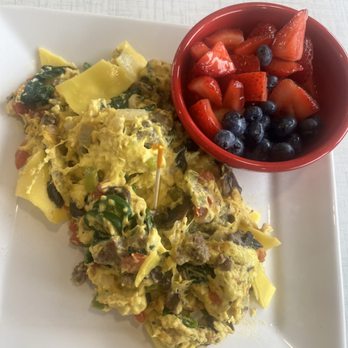 Anna's House - Okemos - Vegan scramble with spinach and jalapeño added with a side side of fruit - Breakfast & Brunch Near Me - Okemos, Michigan