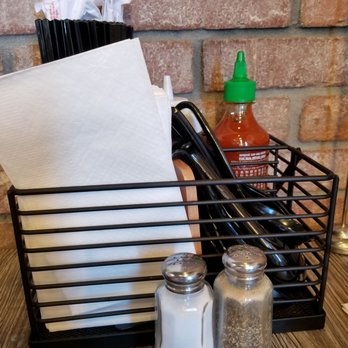 Pho 101 - Tableside utensils (including real chopsticks, and spoons with a "hook" for the edge of the bowl), napkins, and condiments - Vietnamese Near Me - Westminster, California Pho 101 - Tableside utensils (including real chopsticks, and spoons with a "hook" for the edge of the bowl), napkins, and condiments - Vietnamese Near Me - Westminster, California
