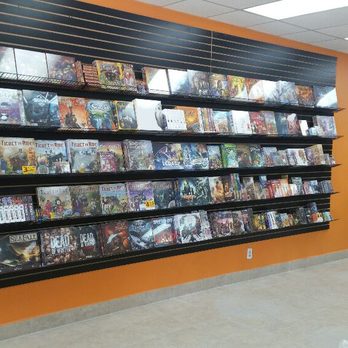 The Gaming Goat - Our game wall, full of some of the most popular titles available! - Hobby Shops Near Me - Bourbonnais, Illinois The Gaming Goat - Our game wall, full of some of the most popular titles available! - Hobby Shops Near Me - Bourbonnais, Illinois