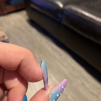 Nails and lashes by Ashley  - Different view from nail lifting about 5 hours after coming back . From them fixing 2 other nails that had lifted, with in 5 days. - Eyelash Service Near Me - Paramount, California