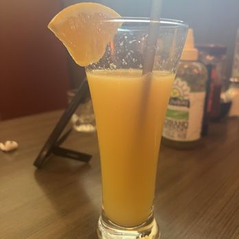 Snooze, an A.M. Eatery - Orange juice mimosa - Breakfast & Brunch Near Me - Houston, Texas Snooze, an A.M. Eatery - Orange juice mimosa - Breakfast & Brunch Near Me - Houston, Texas