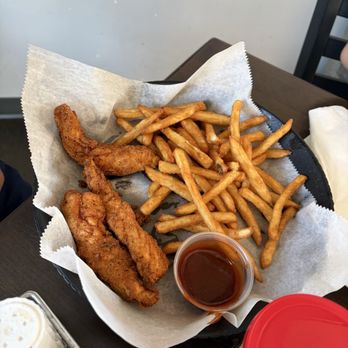 The Win Tavern 33 - Chicken tender basket (I think there was more chicken as we split this for our young boys) - Pubs Near Me - Jenison, Michigan The Win Tavern 33 - Chicken tender basket (I think there was more chicken as we split this for our young boys) - Pubs Near Me - Jenison, Michigan