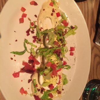 Corinne - Deviled eggs. Not sure what the lettuce is for - Breakfast & Brunch Near Me - Denver, Colorado