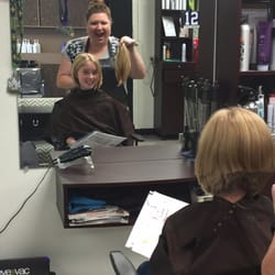 New Image Salon - My daughter and Diana after cutting off her donation ponytail. She was so sweet to my daughter. 5 stars!