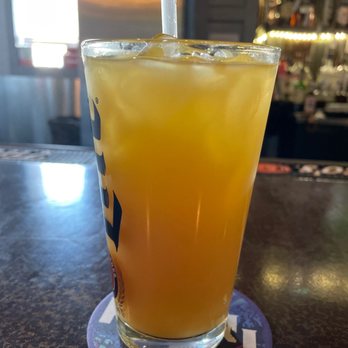 278 South - a glass of orange juice on a coaster - Beer Bar Near Me 278 South - a glass of orange juice on a coaster - Beer Bar Near Me