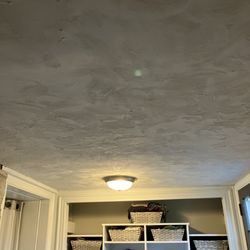 Laporta - Textured plaster ceiling restored from water damage.