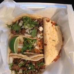 Chorizo taco, chicken taco, steak taco and chicken quesadilla Chorizo taco, chicken taco, steak taco and chicken quesadilla