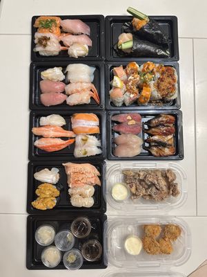 Kura Revolving Sushi Bar by null