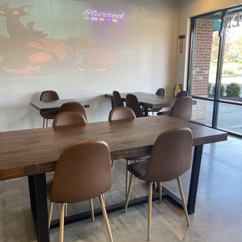Tiger Sugar - John's Creek - Interior with projector in background - Bubble Tea Near Me - Duluth, Georgia