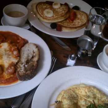 Saggio - Top to bottom: Pancakes, Eggs Ragu, Mushroom and Fontina Omelette - Italian Near Me - New York, New York Saggio - Top to bottom: Pancakes, Eggs Ragu, Mushroom and Fontina Omelette - Italian Near Me - New York, New York