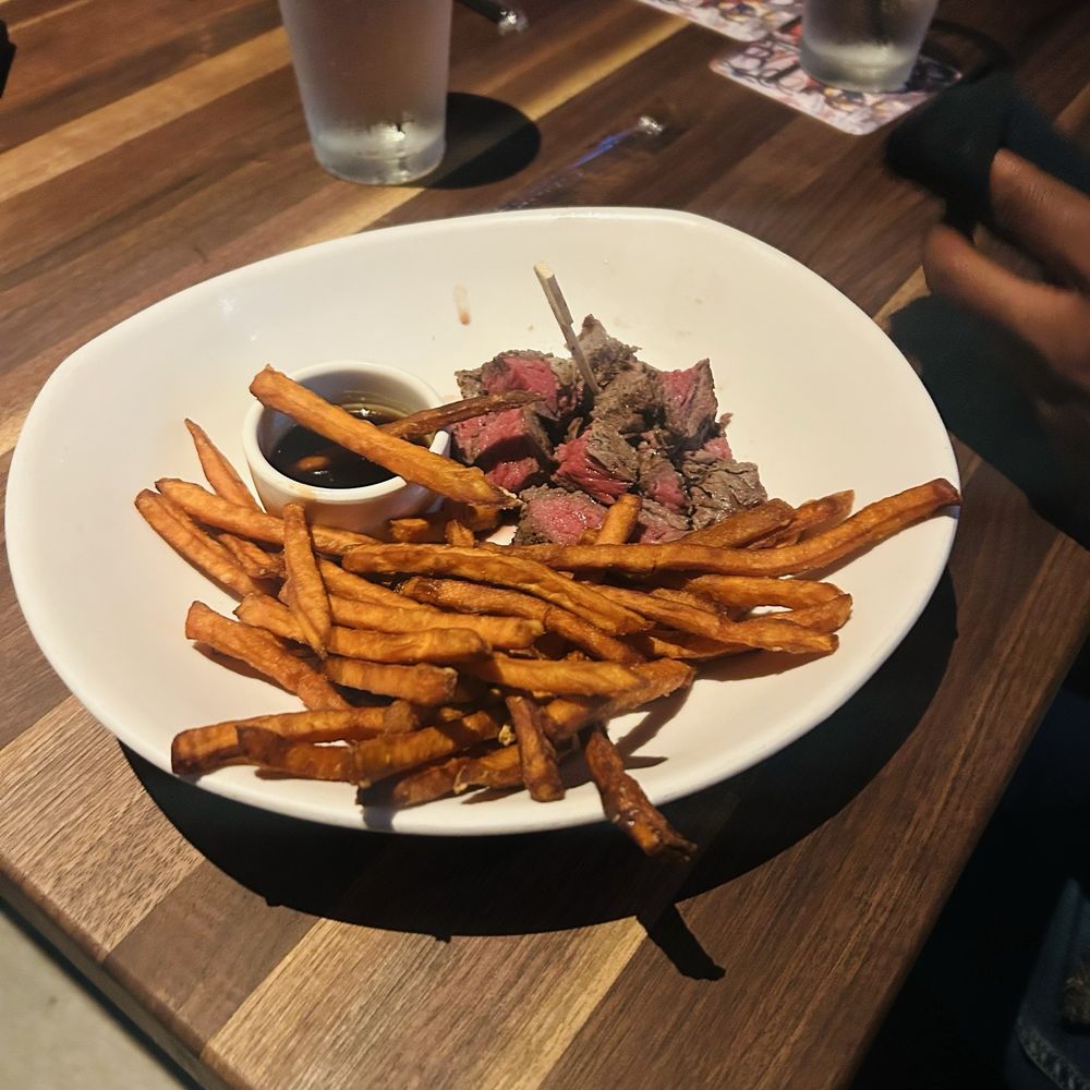 Yard House - Steak and Sweet Potato Fries - New American Near Me - Orlando, Florida Yard House - Steak and Sweet Potato Fries - New American Near Me - Orlando, Florida