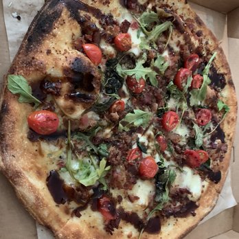 Blaze Pizza - Not a freshly baked pizza. Missing balsamic,basil,oregano, half the pizza missing cheese. The drizzle is actually bbq. - Salad Near Me - Atlanta, Georgia