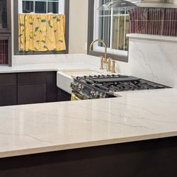 Aqua Kitchen and Bath Design Center - Kitchen Countertop installation with salt & pepper rack
