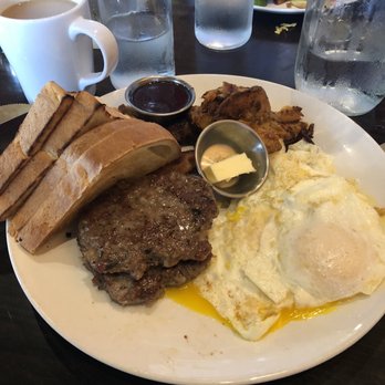 Rooster - Downtown - Farmers platter w/ over easy eggs and white toast - Creperies Near Me - St. Louis, Missouri Rooster - Downtown - Farmers platter w/ over easy eggs and white toast - Creperies Near Me - St. Louis, Missouri