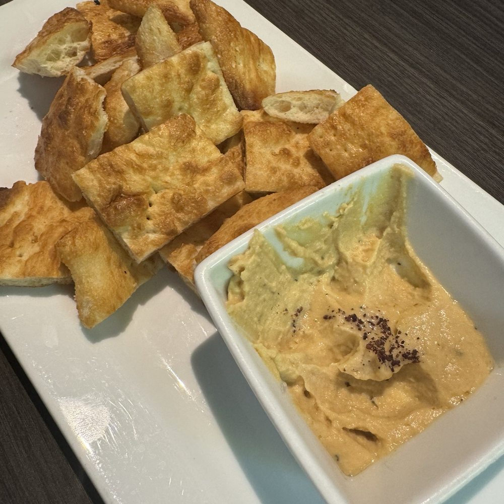 Flames Mediterranean Restaurant - Complimentary hummus with pita - Mediterranean Near Me - Shreveport, Louisiana Flames Mediterranean Restaurant - Complimentary hummus with pita - Mediterranean Near Me - Shreveport, Louisiana