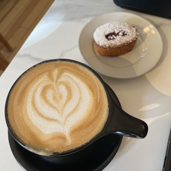 Taste Coffee - Almond milk latte and Friand (almond flour cake - so light and delicious!) - Coffee Roasteries Near Me - Durango, Colorado